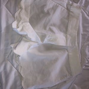 White scalloped shorts
